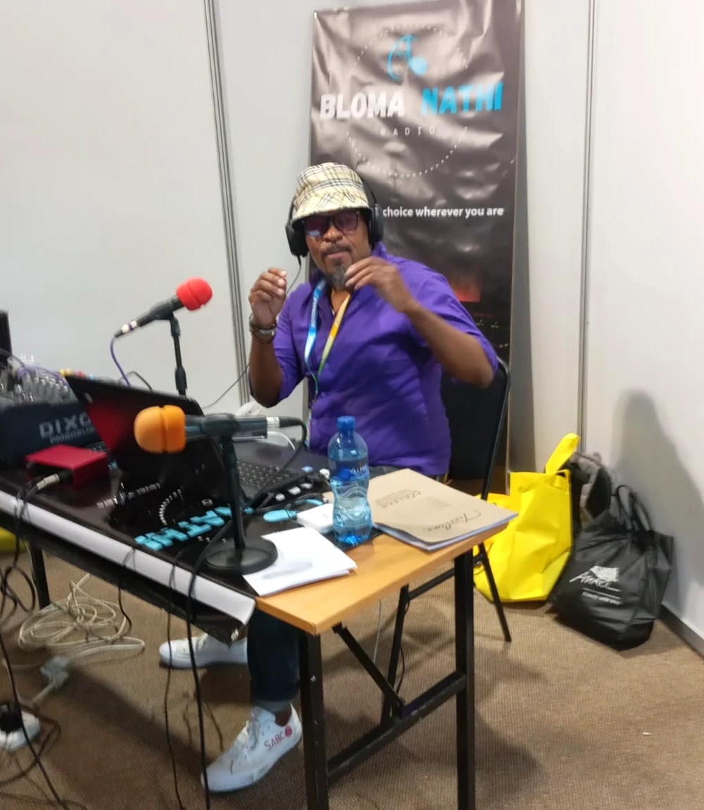 A Bloma Nathi presenter on air at the station's broadcast desk